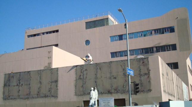 Workers atop the old CBS Studios.