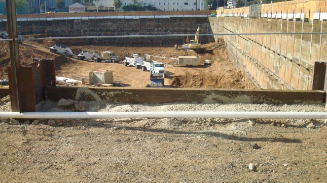 Another shot of workers preparing the foundation.
