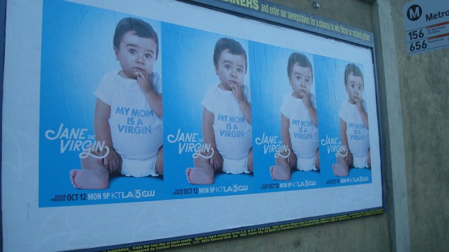 Mini billboard tacked on to a mini mall