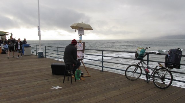 An artist waiting for customers.