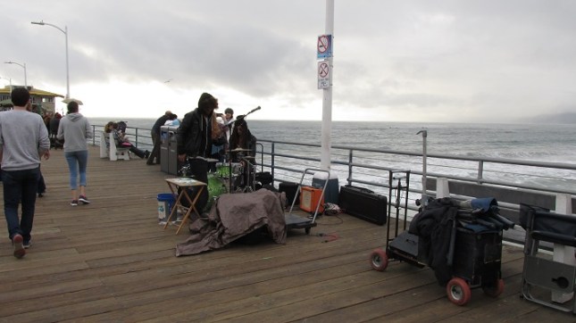 Musicians setting up their stuff.