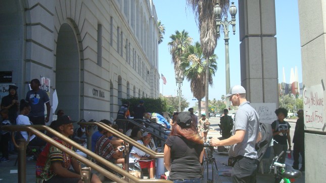 Protesters on the steps of City Hall this past week.