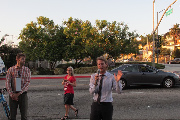 Noah Grynberg, of LACCLA, speaks to the crowd.